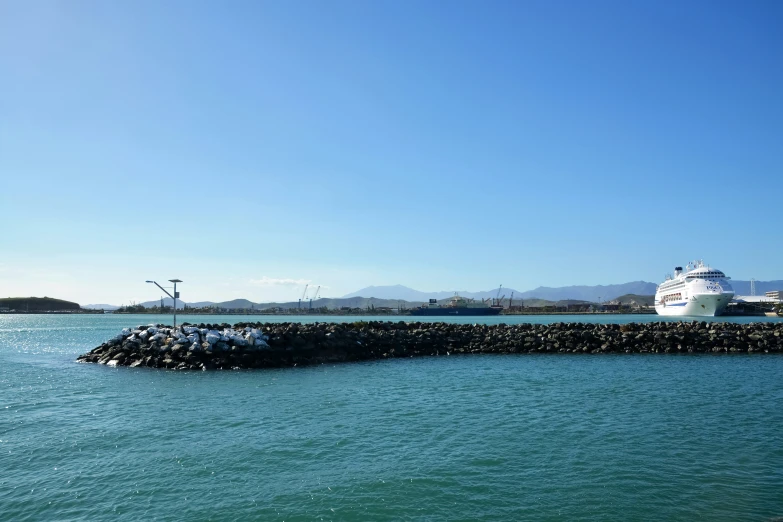 a large cruise ship is docked at the pier