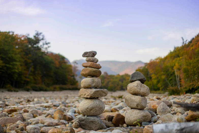 the stack of rocks is next to each other