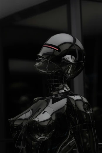 a chrome colored robot with his head turned