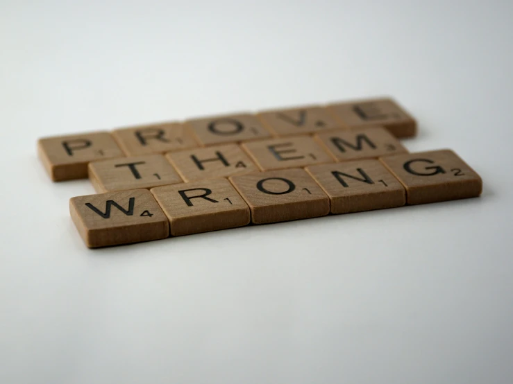 a group of scrabble letters that spell out words