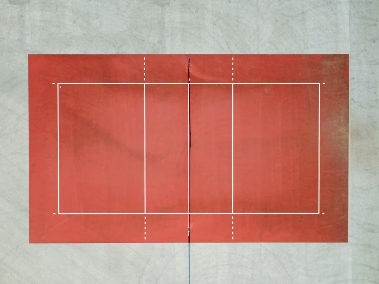 a court with a line drawn on it with two tennis racquets