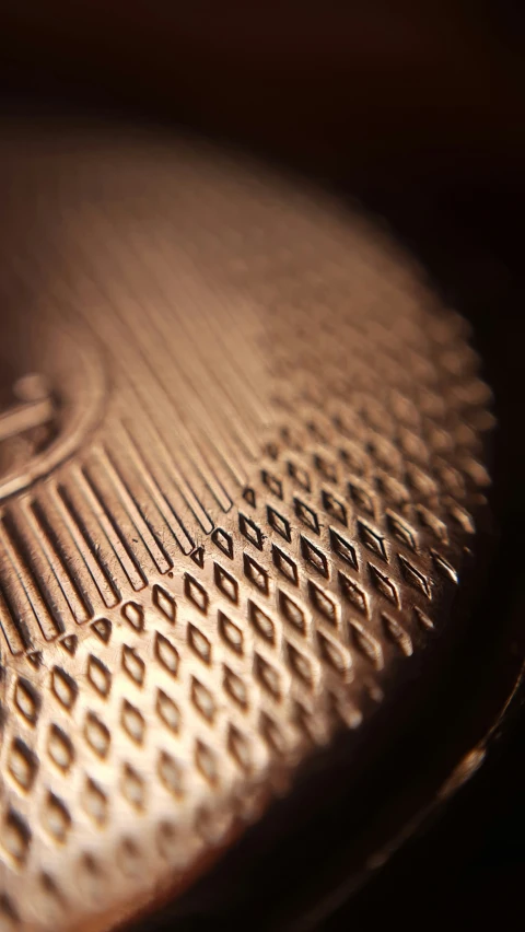 a close - up of a metal object that is made with stainless steel