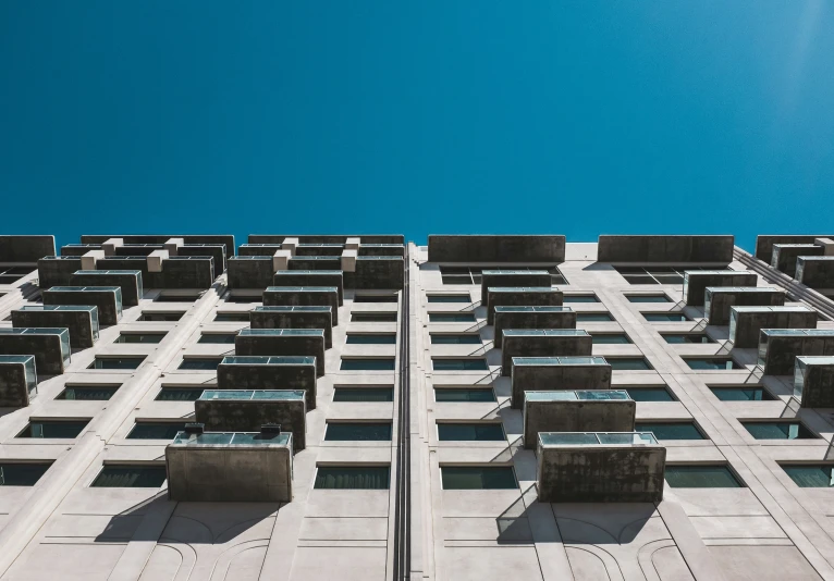 an aerial view of the bottom part of an apartment building