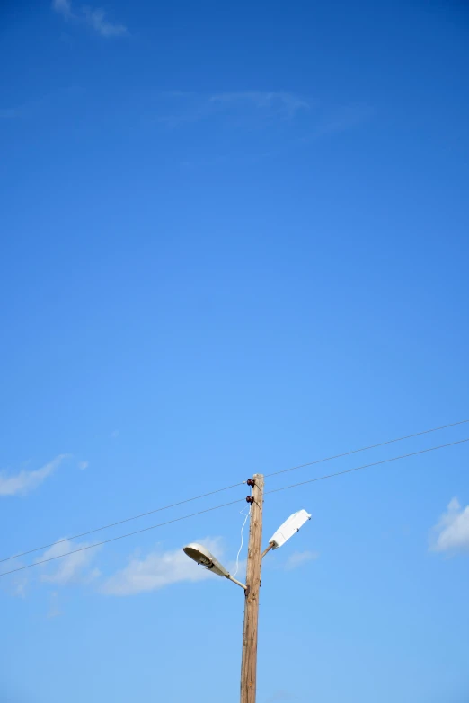 a street light with a sky background