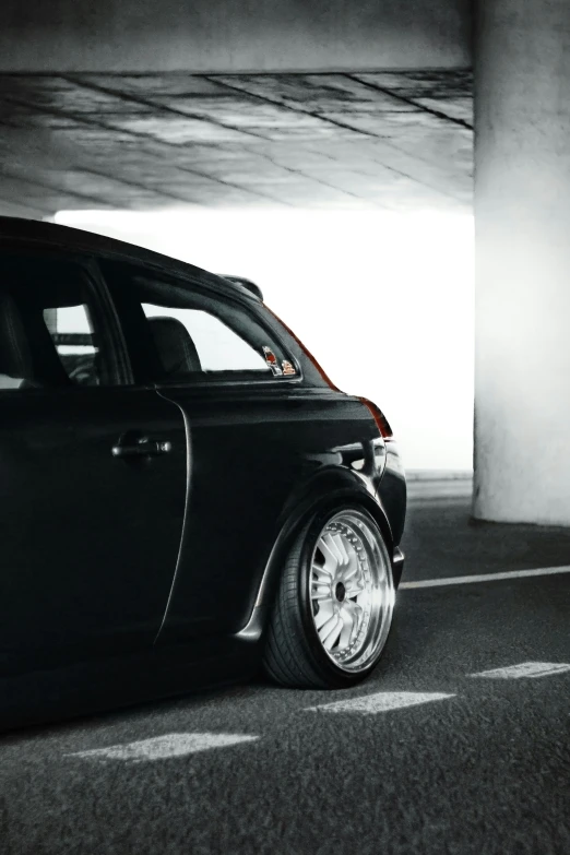 an automobile parked in an parking garage