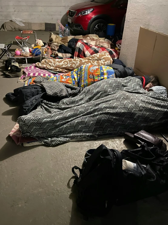 a pile of luggage sitting in the middle of a room