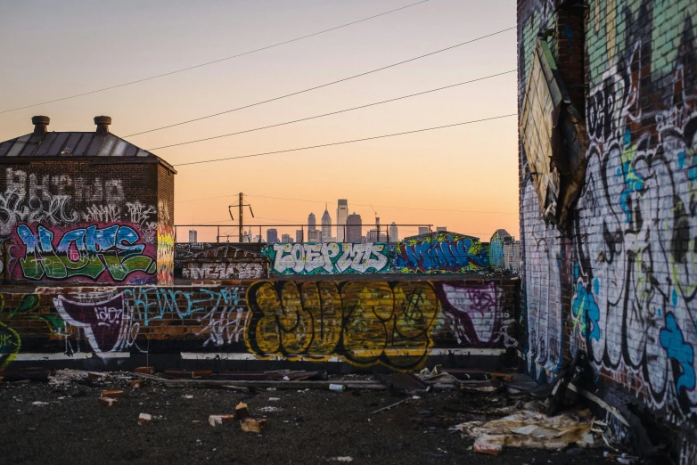 a large building with lots of graffiti on the wall