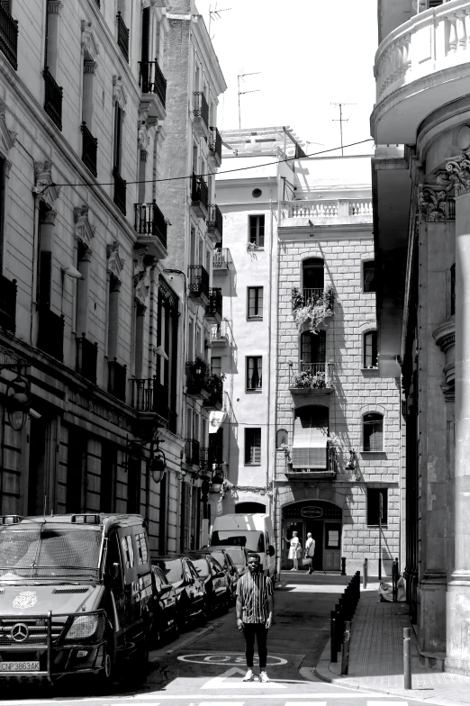 a couple walking down the street in a city