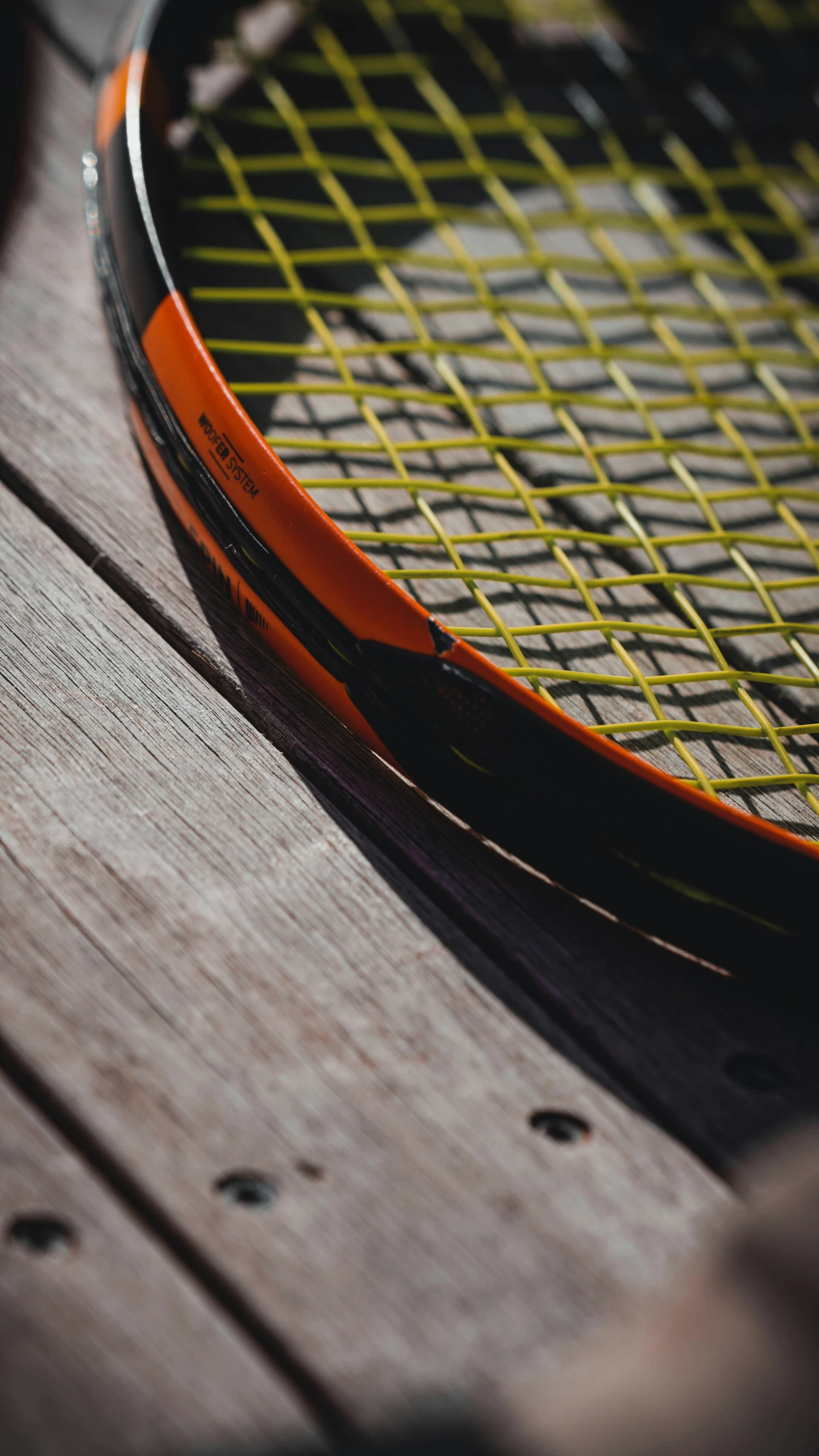 a tennis racket sitting on the ground