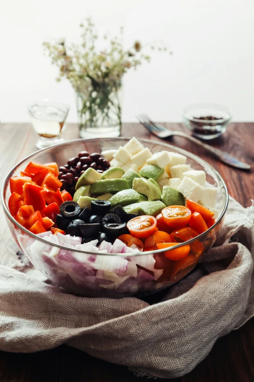 a bowl with some different foods inside of it