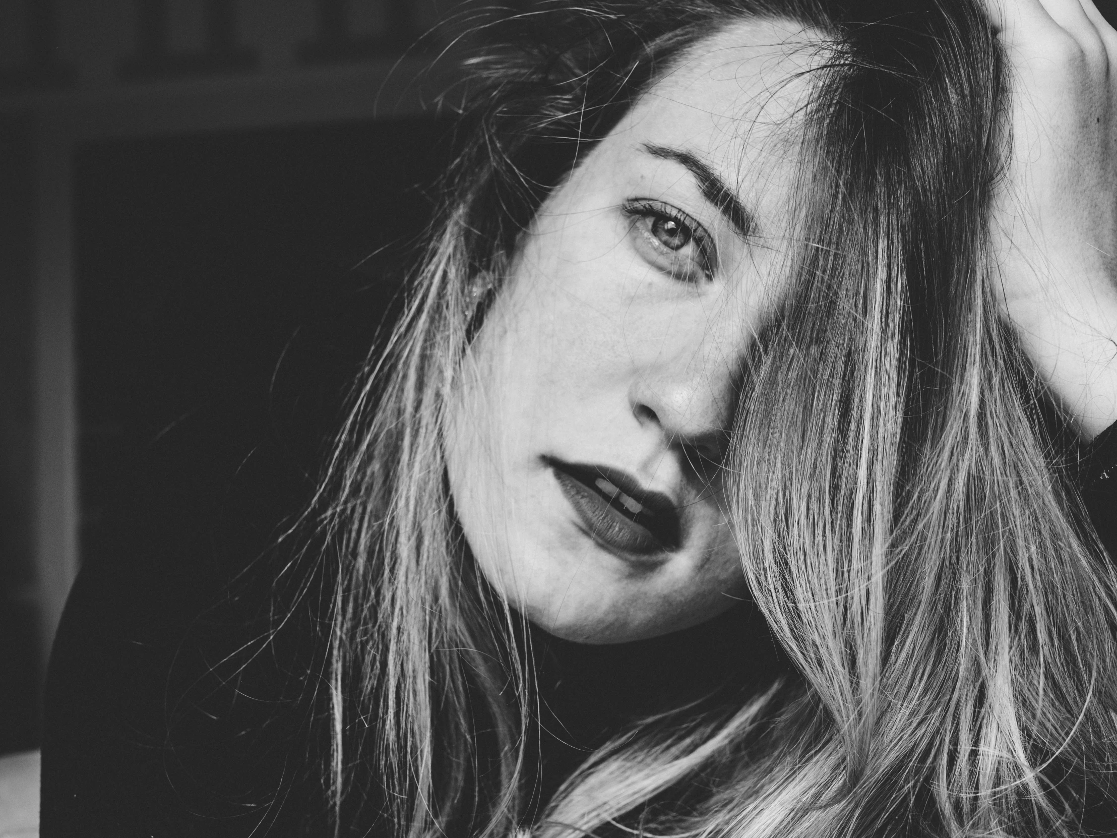 black and white pograph of a girl with long hair