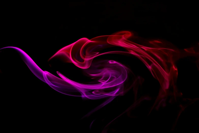 an abstract color painting of a swirl in red and purple