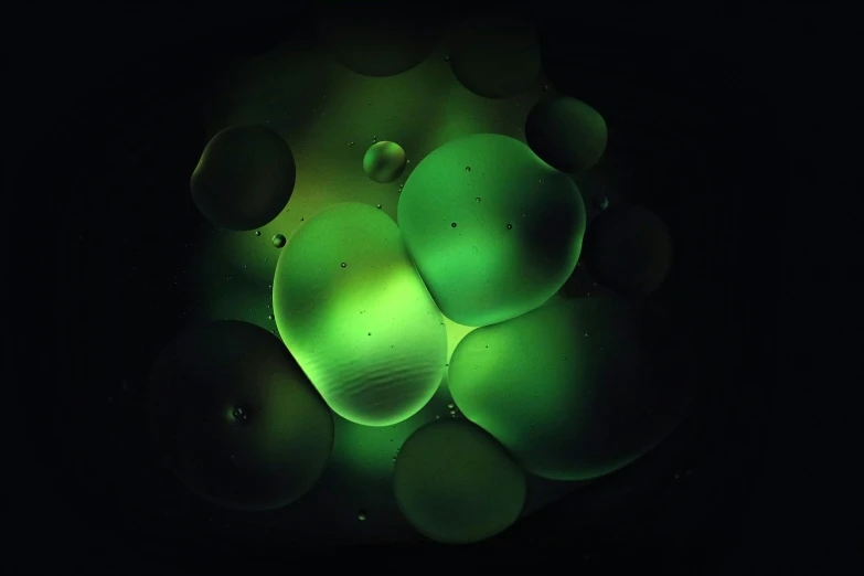 a group of bubbles with glowing lights inside