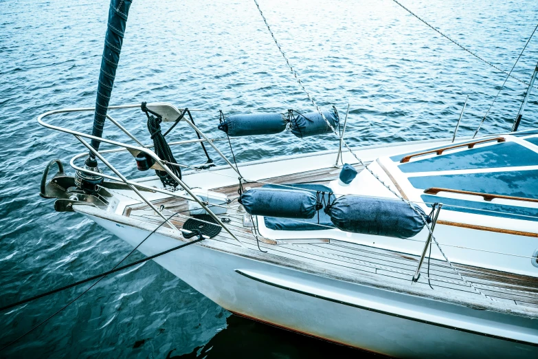 a sailboat is on the water and docked