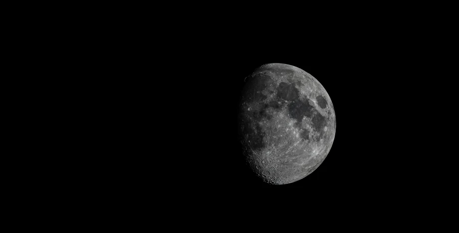 the moon in dark skies during a full moon