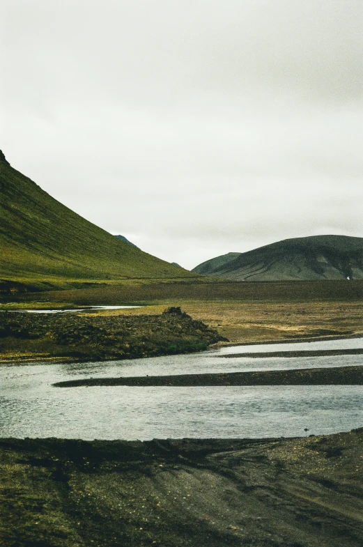 the distant area has two mountains in it