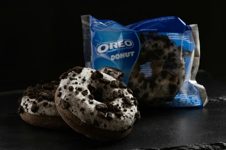 two bags of chocolate chip donuts are next to each other