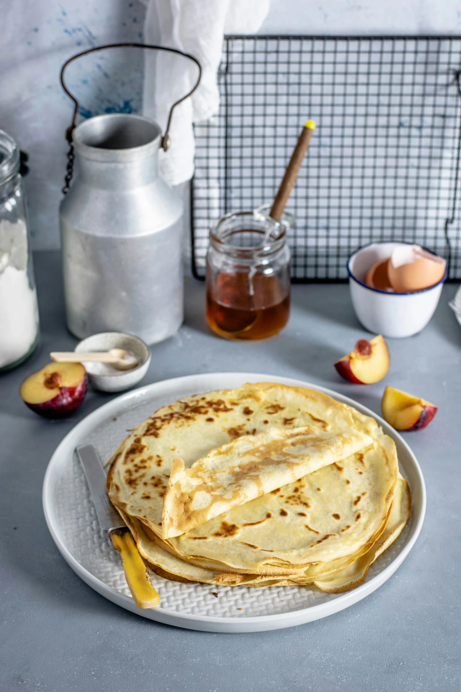 pancakes with lemon slices in the middle on a plate