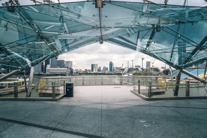 an empty open walkway with benches in the center