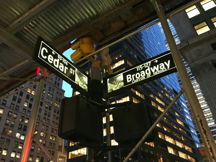 street signs that are next to a building