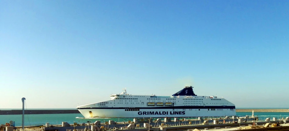 a cruise ship that is docked at a dock