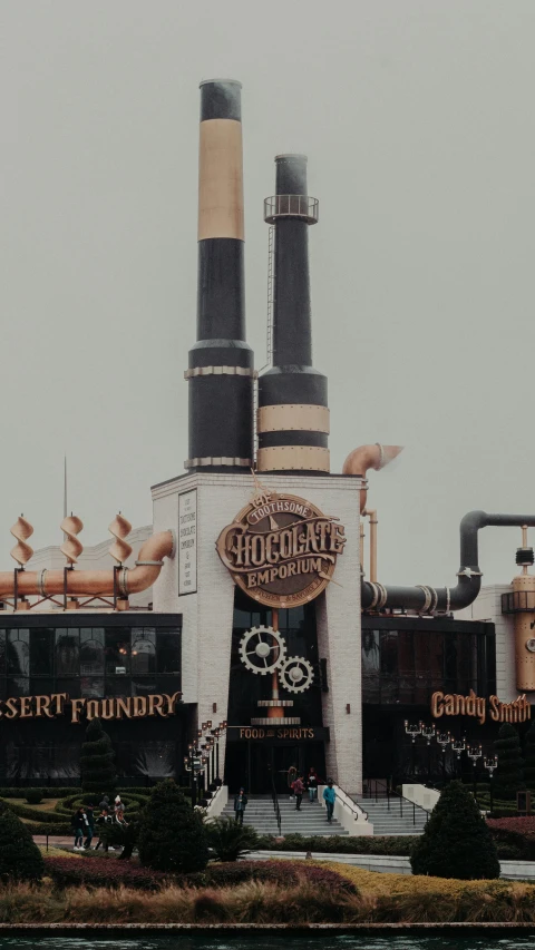 a picture of a smokestacks and signs on the side of a building