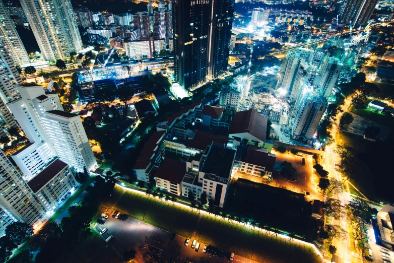 the view of a city at night from above