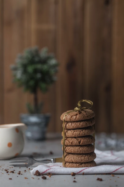 there is a stack of cookies with coffee