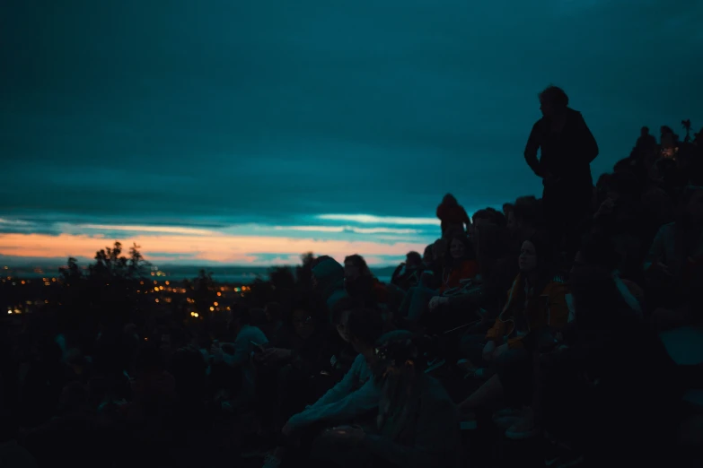 a man standing on top of a pile of garbage in the dark