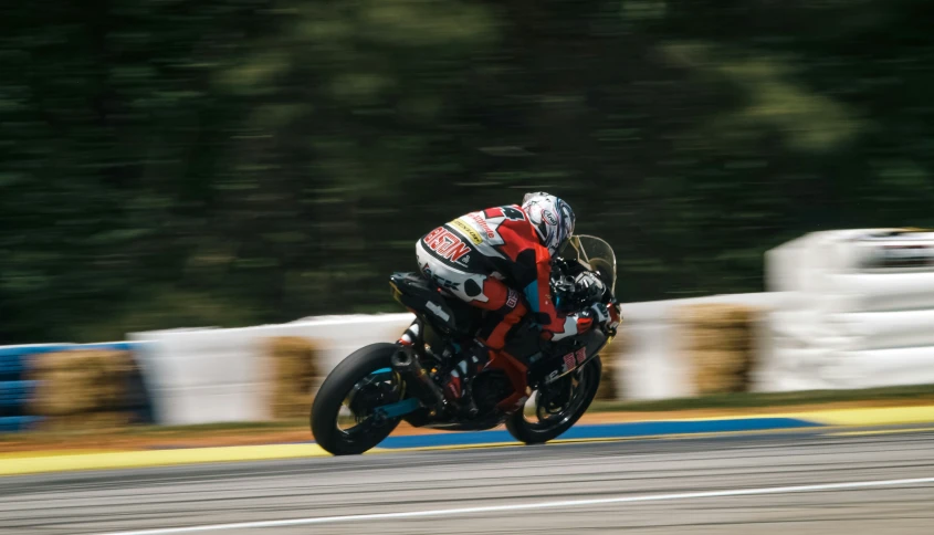 a person riding on the back of a motorcycle