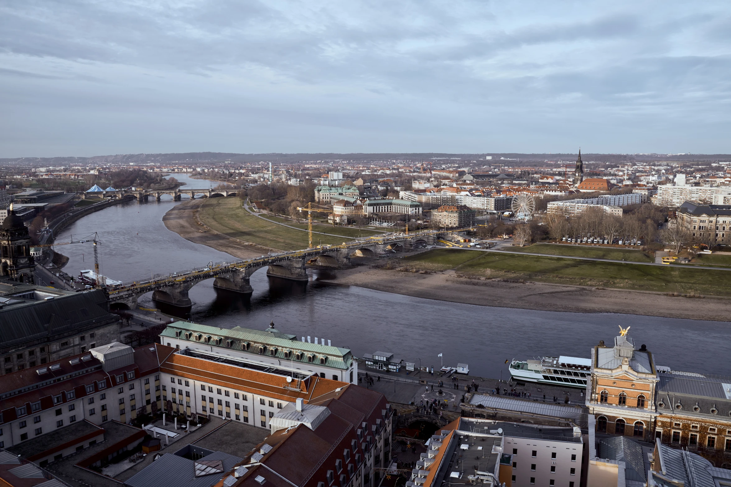 the large city is next to the water and is near many other buildings