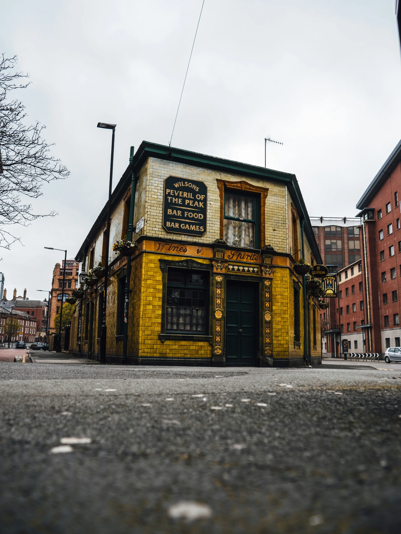 yellow building with a sign that says black and white