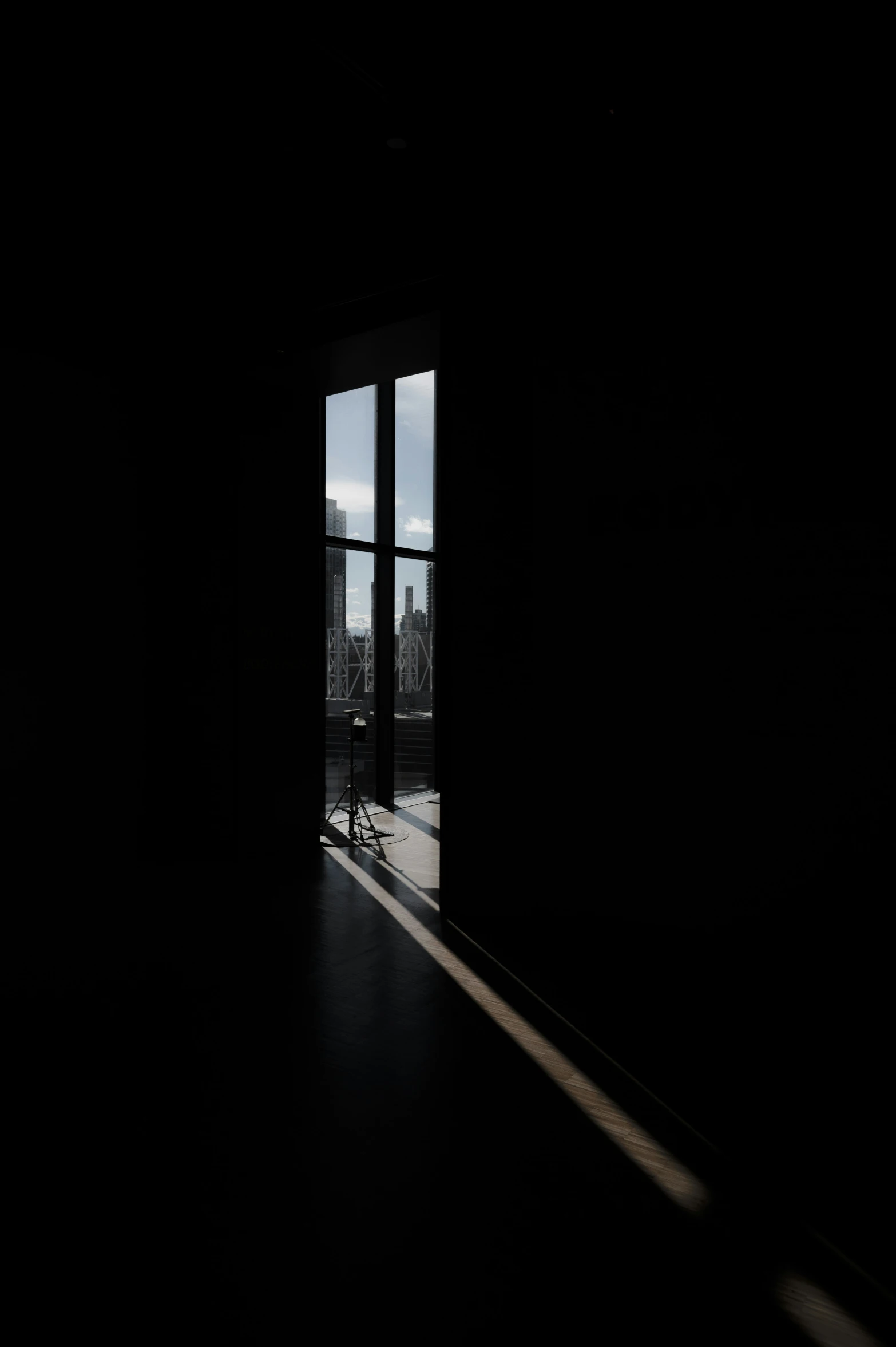 a large open door leading into a dark room