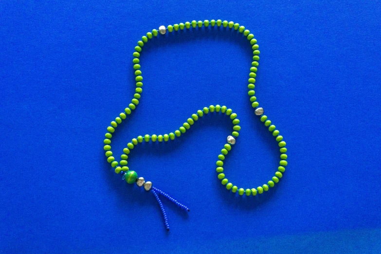 a small beaded celet and tassel