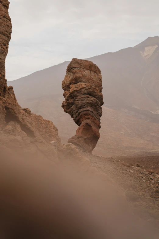 a mountain landscape that has some rocks in it