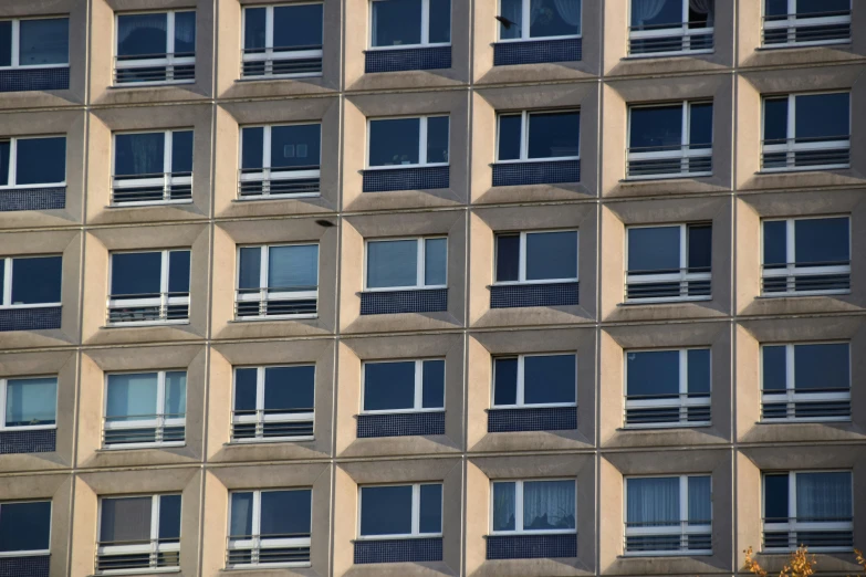 a close up view of a window and balconies on a building