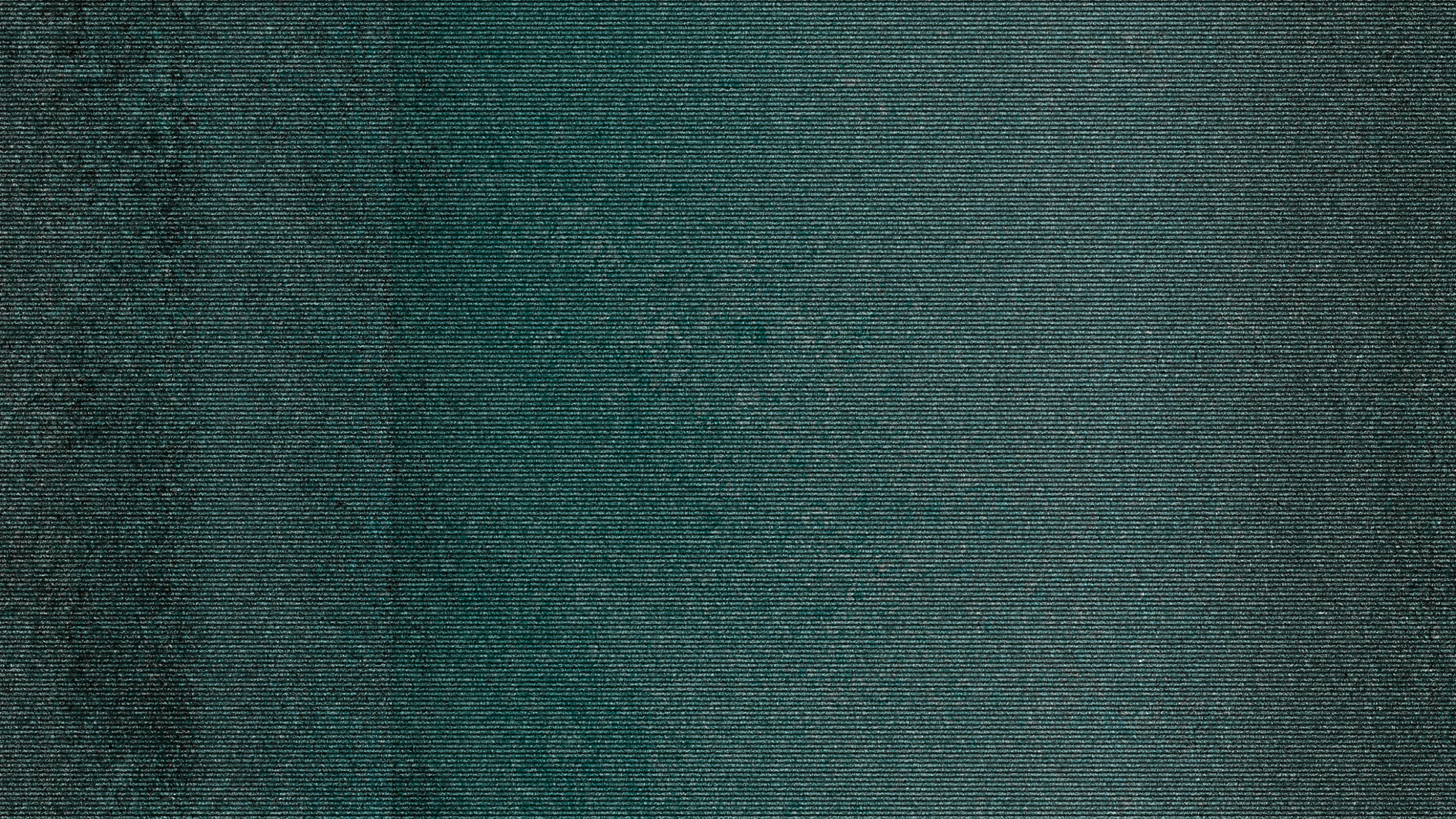 an image of black and green text texture