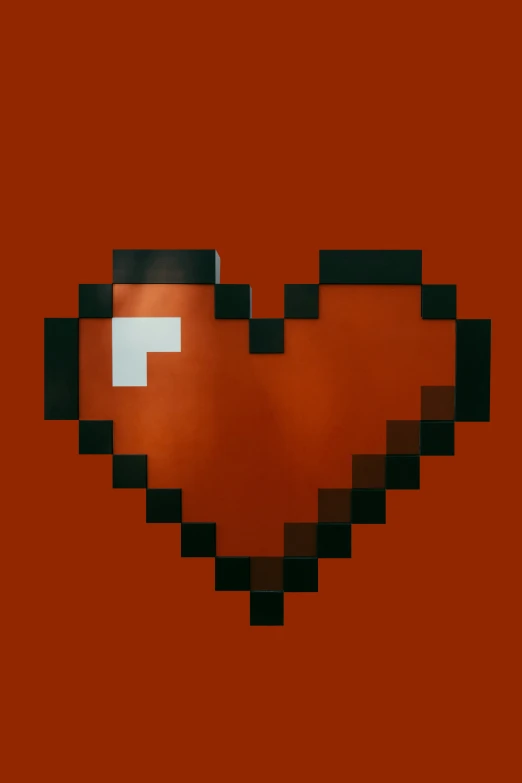 a red heart shape pixelated with two white heart shapes