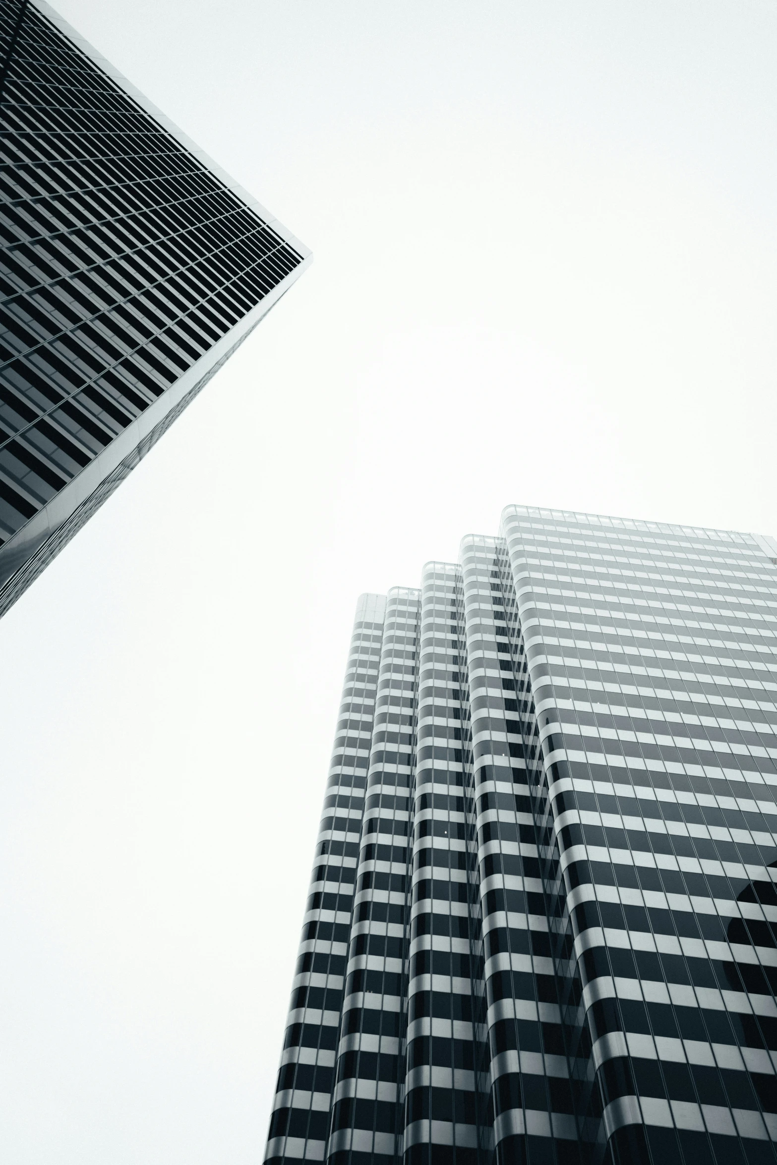 some very tall buildings on a clear day