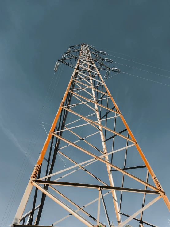 view of an industrial power tower with many lines