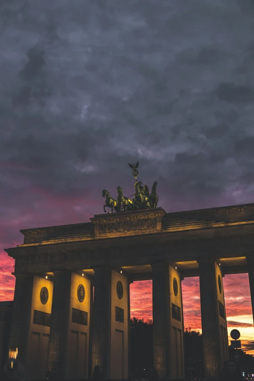 the monument is lit up at dusk