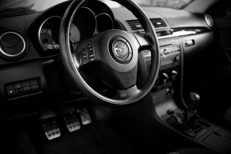 a dashboard and a steering wheel of an automobile
