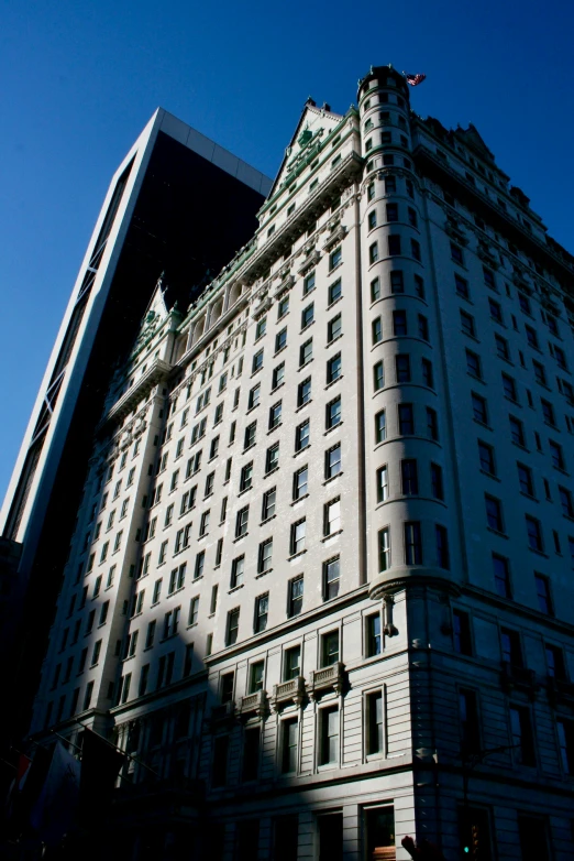 a very tall building with clocks on the front