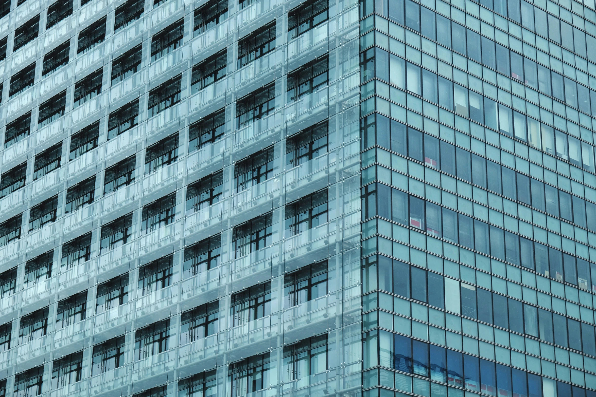 an office building is seen here against the blue sky