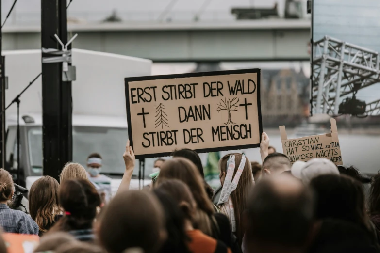 a protest in german that shows the names of those protest groups