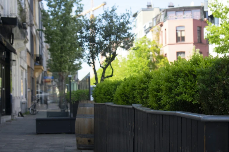 a street with people walking down it is very narrow