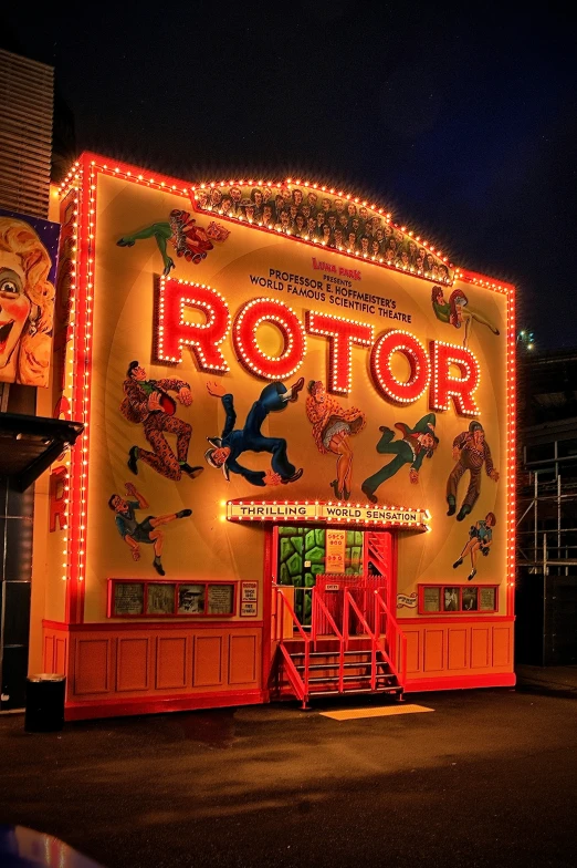 an orange building lit up with lots of lights