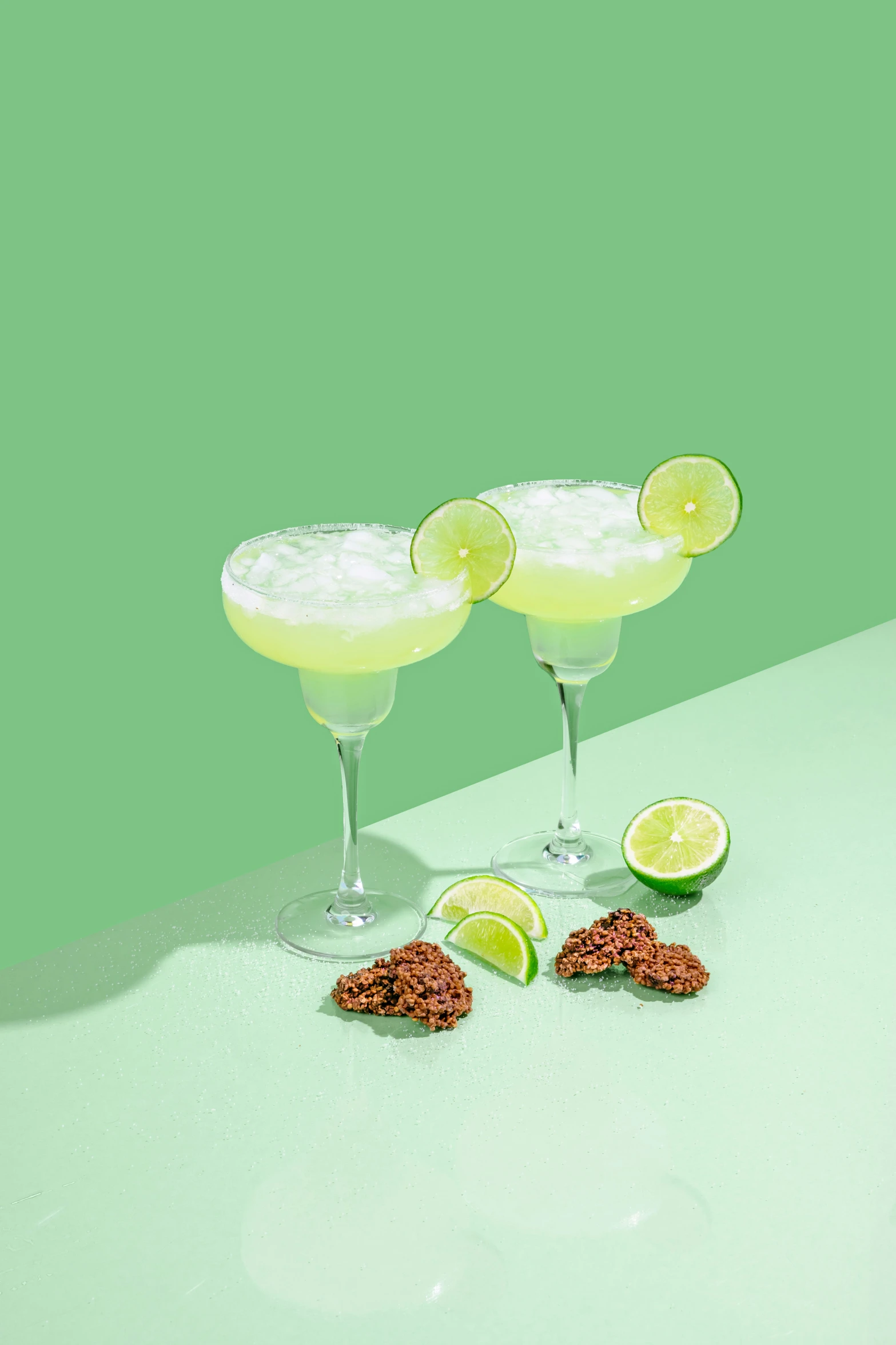 limeade martinis with a lime twist and garnishes