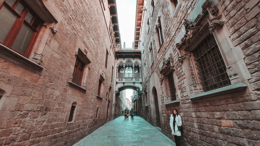 a narrow cobblestone street in a historical european town