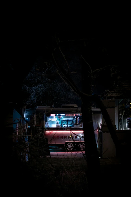 some trees and a bus that is parked